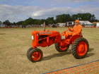 Allis-Chalmers version of a trike.  "Love the colour."
